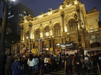 Demonstrators shout slogans as they participate in a protest against Sao Paulo's governor, Tarcisio de Freitas, and the violence of the poli...