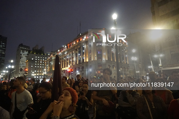 Demonstrators shout slogans as they participate in a protest against Sao Paulo's governor, Tarcisio de Freitas, and the violence of the poli...