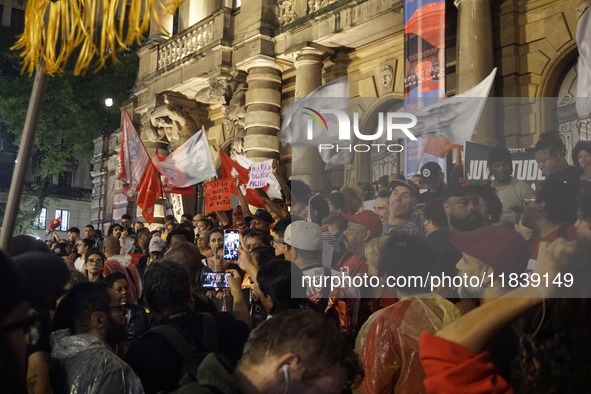 Demonstrators shout slogans as they participate in a protest against Sao Paulo's governor, Tarcisio de Freitas, and the violence of the poli...