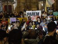 Demonstrators shout slogans as they participate in a protest against Sao Paulo's governor, Tarcisio de Freitas, and the violence of the poli...