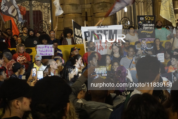 Demonstrators shout slogans as they participate in a protest against Sao Paulo's governor, Tarcisio de Freitas, and the violence of the poli...