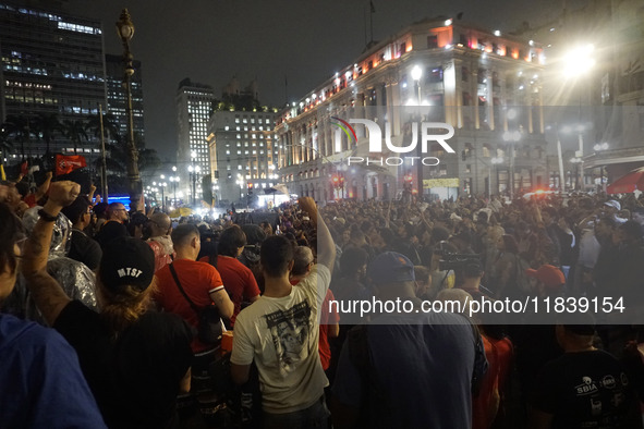 Demonstrators shout slogans as they participate in a protest against Sao Paulo's governor, Tarcisio de Freitas, and the violence of the poli...