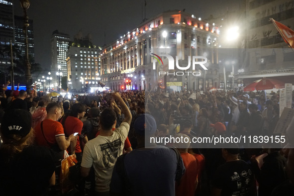 Demonstrators shout slogans as they participate in a protest against Sao Paulo's governor, Tarcisio de Freitas, and the violence of the poli...