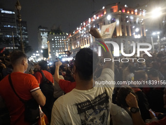 Demonstrators shout slogans as they participate in a protest against Sao Paulo's governor, Tarcisio de Freitas, and the violence of the poli...