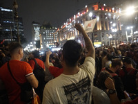 Demonstrators shout slogans as they participate in a protest against Sao Paulo's governor, Tarcisio de Freitas, and the violence of the poli...