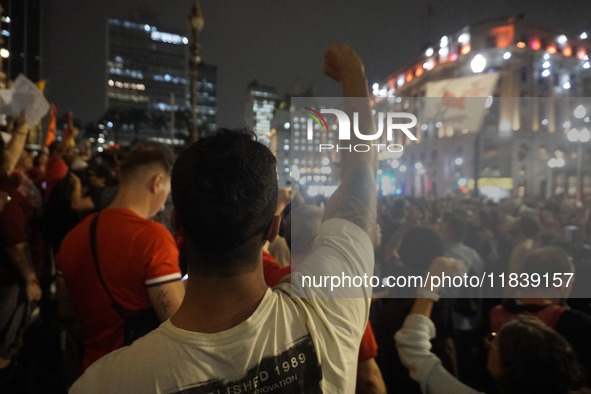 Demonstrators shout slogans as they participate in a protest against Sao Paulo's governor, Tarcisio de Freitas, and the violence of the poli...