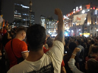 Demonstrators shout slogans as they participate in a protest against Sao Paulo's governor, Tarcisio de Freitas, and the violence of the poli...