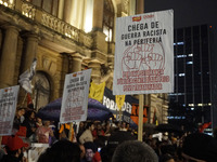 Demonstrators shout slogans as they participate in a protest against Sao Paulo's governor, Tarcisio de Freitas, and the violence of the poli...