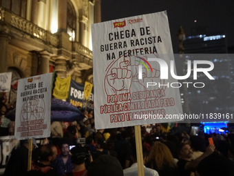 Demonstrators shout slogans as they participate in a protest against Sao Paulo's governor, Tarcisio de Freitas, and the violence of the poli...