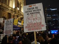 Demonstrators shout slogans as they participate in a protest against Sao Paulo's governor, Tarcisio de Freitas, and the violence of the poli...