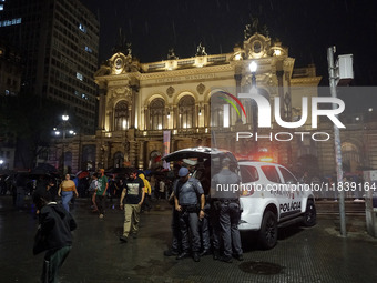 Demonstrators shout slogans as they participate in a protest against Sao Paulo's governor, Tarcisio de Freitas, and the violence of the poli...