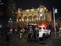 Demonstrators shout slogans as they participate in a protest against Sao Paulo's governor, Tarcisio de Freitas, and the violence of the poli...