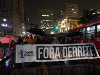 Demonstrators shout slogans as they participate in a protest against Sao Paulo's governor, Tarcisio de Freitas, and the violence of the poli...