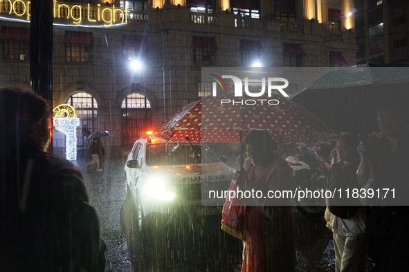 Demonstrators shout slogans as they participate in a protest against Sao Paulo's governor, Tarcisio de Freitas, and the violence of the poli...