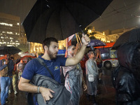 Demonstrators shout slogans as they participate in a protest against Sao Paulo's governor, Tarcisio de Freitas, and the violence of the poli...