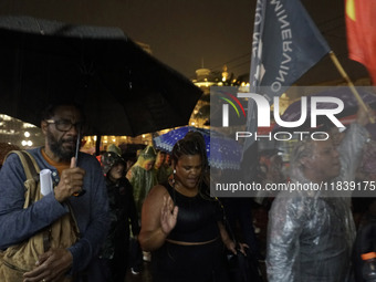 Demonstrators shout slogans as they participate in a protest against Sao Paulo's governor, Tarcisio de Freitas, and the violence of the poli...