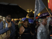 Demonstrators shout slogans as they participate in a protest against Sao Paulo's governor, Tarcisio de Freitas, and the violence of the poli...