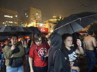 Demonstrators shout slogans as they participate in a protest against Sao Paulo's governor, Tarcisio de Freitas, and the violence of the poli...