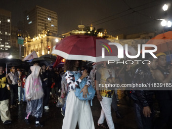 Demonstrators shout slogans as they participate in a protest against Sao Paulo's governor, Tarcisio de Freitas, and the violence of the poli...