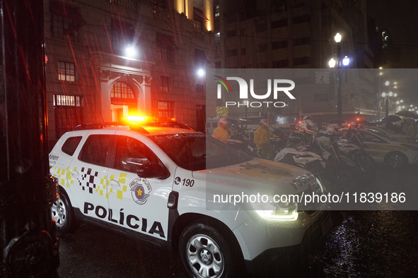 Demonstrators shout slogans as they participate in a protest against Sao Paulo's governor, Tarcisio de Freitas, and the violence of the poli...