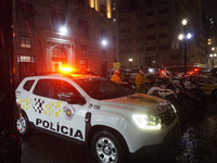 Demonstrators shout slogans as they participate in a protest against Sao Paulo's governor, Tarcisio de Freitas, and the violence of the poli...