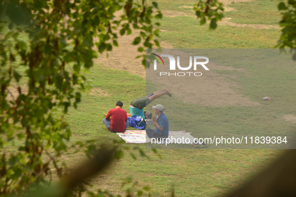 Indian people exercise at a ground in Siliguri, India, on December 6, 2024. 