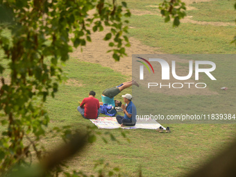 Indian people exercise at a ground in Siliguri, India, on December 6, 2024. (