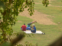 Indian people exercise at a ground in Siliguri, India, on December 6, 2024. (