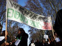 A banner reads 'you, me, us, families, children, seniors, all affected'. Between 8,000 and 10,000 protesters march in Toulouse, France, on D...