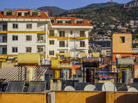 A general view of the dense city development with visible roofs full of solar installations for heating water is seen in Alanya, Antalya, Tu...