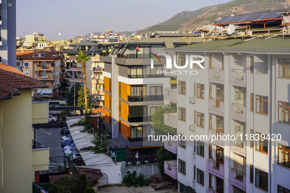 Dense urban development with hotels squeezed between residential buildings is seen in Alanya, Turkey, on November 3, 2024. 