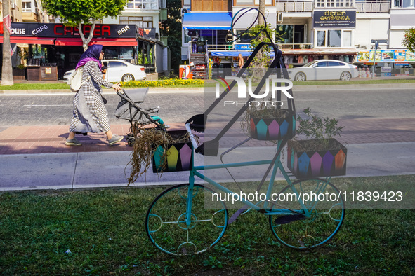 A street flower stand made from an old bicycle is seen in Alanya, Turkey, on November 3, 2024. 