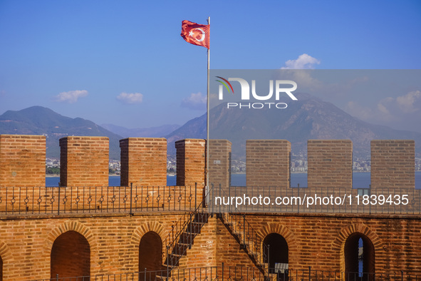 The Turkish flag on the top of the Red Tower is seen in Alanya, Turkey, on November 5, 2024. 