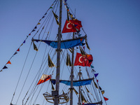 Turkish flags on a tourist ship wave in Alanya, Turkey, on November 6, 2024. (