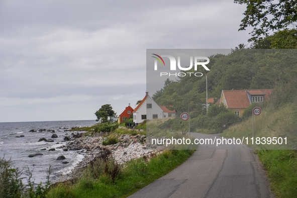 The Baltic Sea coast with a few houses is seen near Hasle, Bornholm Island, Denmark, on August 5, 2024. 