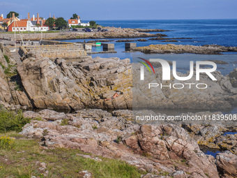 The rocky coast of the Baltic Sea is seen in Gudhjem, Bornholm Island, Denmark, on August 6, 2024. (