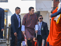 Bhutanese King Jigme Khesar Namgyel Wangchuk (center) arrives at Swayambhunath Stupa, a UNESCO World Heritage Site, during a five-hour trans...