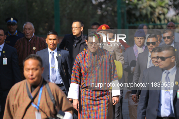 Bhutanese King Jigme Khesar Namgyel Wangchuk (center) arrives at Swayambhunath Stupa, a UNESCO World Heritage Site, during a five-hour trans...