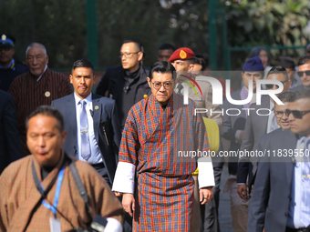 Bhutanese King Jigme Khesar Namgyel Wangchuk (center) arrives at Swayambhunath Stupa, a UNESCO World Heritage Site, during a five-hour trans...