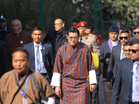 Bhutanese King Jigme Khesar Namgyel Wangchuk (center) arrives at Swayambhunath Stupa, a UNESCO World Heritage Site, during a five-hour trans...