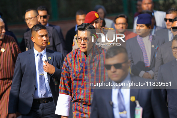 Bhutanese King Jigme Khesar Namgyel Wangchuk (center) arrives at Swayambhunath Stupa, a UNESCO World Heritage Site, during a five-hour trans...