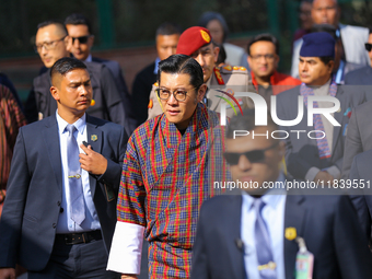 Bhutanese King Jigme Khesar Namgyel Wangchuk (center) arrives at Swayambhunath Stupa, a UNESCO World Heritage Site, during a five-hour trans...