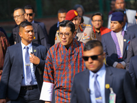 Bhutanese King Jigme Khesar Namgyel Wangchuk (center) arrives at Swayambhunath Stupa, a UNESCO World Heritage Site, during a five-hour trans...