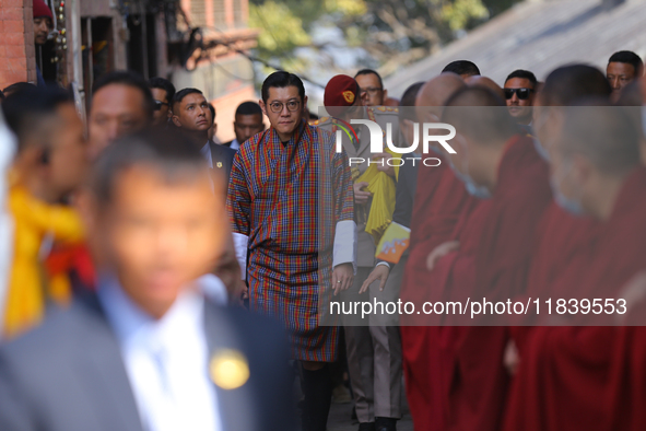 Bhutanese King Jigme Khesar Namgyel Wangchuk (center) is welcomed by monks at Swayambhunath Stupa, a UNESCO World Heritage Site, as he spend...