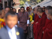 Bhutanese King Jigme Khesar Namgyel Wangchuk (center) is welcomed by monks at Swayambhunath Stupa, a UNESCO World Heritage Site, as he spend...