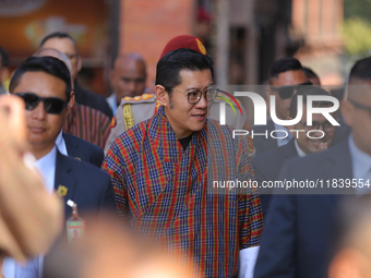 Bhutanese King Jigme Khesar Namgyel Wangchuk (center) arrives at Swayambhunath Stupa, a UNESCO World Heritage Site, during a five-hour trans...