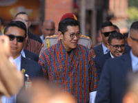 Bhutanese King Jigme Khesar Namgyel Wangchuk (center) arrives at Swayambhunath Stupa, a UNESCO World Heritage Site, during a five-hour trans...