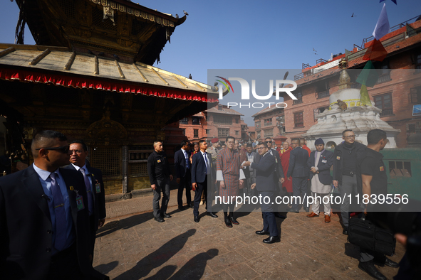 Bhutanese King Jigme Khesar Namgyel Wangchuk (center) tours Swayambhunath Stupa, a UNESCO World Heritage Site, during a five-hour transit in...