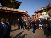 Bhutanese King Jigme Khesar Namgyel Wangchuk (center) tours Swayambhunath Stupa, a UNESCO World Heritage Site, during a five-hour transit in...