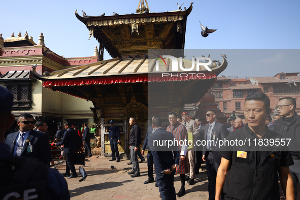 Bhutanese King Jigme Khesar Namgyel Wangchuk (center) tours Swayambhunath Stupa, a UNESCO World Heritage Site, during a five-hour transit in...